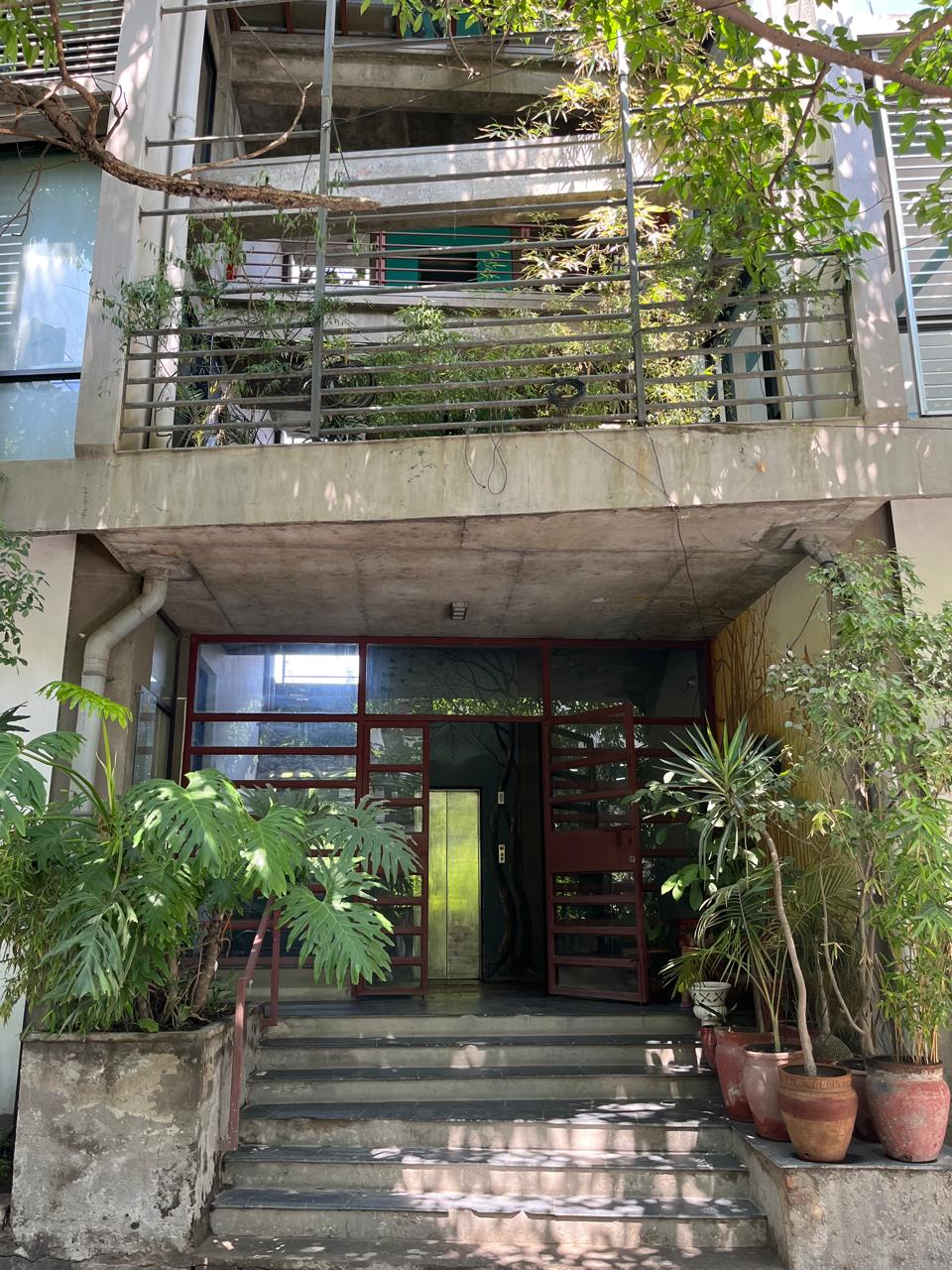Sura: A commercial building in Darbarmarg Kathmandu the lop floor has two apartments with roof garden.